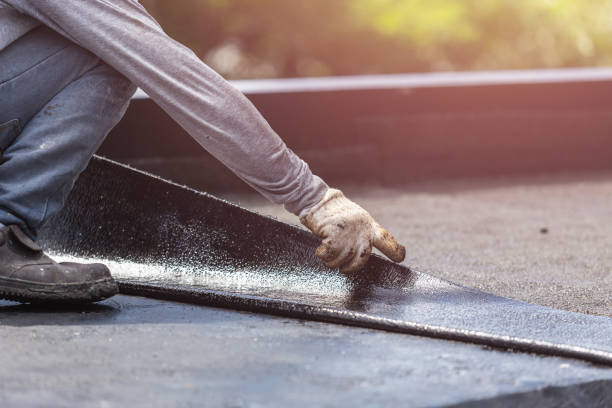 Professional Waterproofing technician working in New London, OH